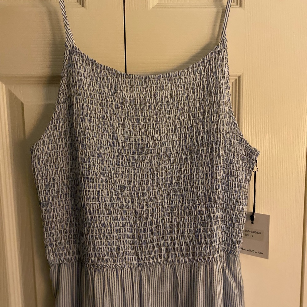 Blue and white jumper.